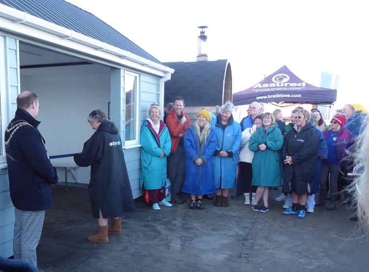 Lady Lorimer cuts the ribbon to officially unveil the new beach shelter