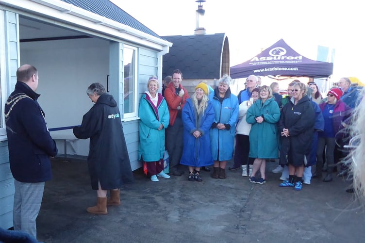 Lady Lorimer cuts the ribbon to officially unveil the new beach shelter