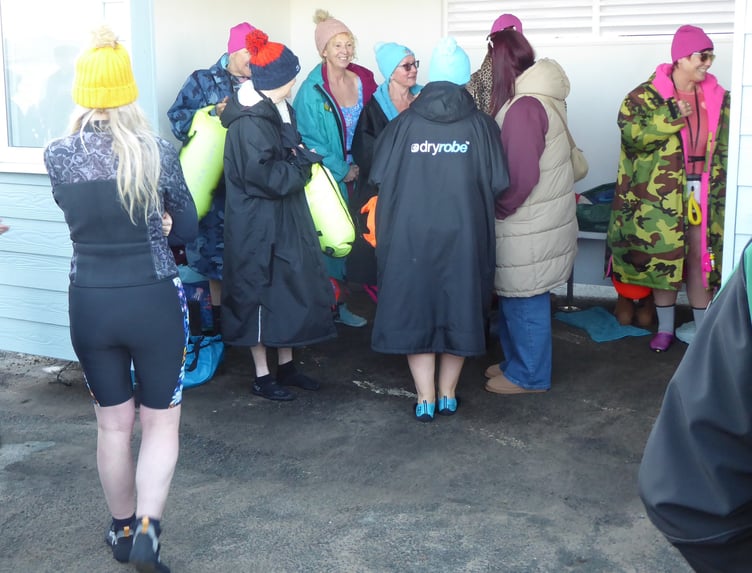 The Northern Dipping Group gather inside the shelter