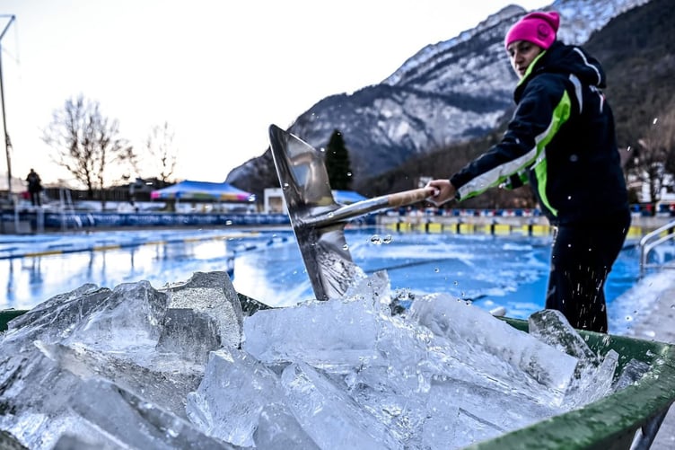 Such were the temperatures in the Italian Dolomites that the pool froze over before the event and therefore had to be broken up completely for the safety of the swimmers