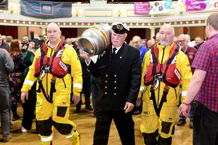 The 2024 Beer and Cider Festival was opened by Captain Stephen Carter, supported by members of Douglas RNLI lifeboat station. Pictured left to right: Edward Bennett, Captain Stephen Carter and Tony Randle