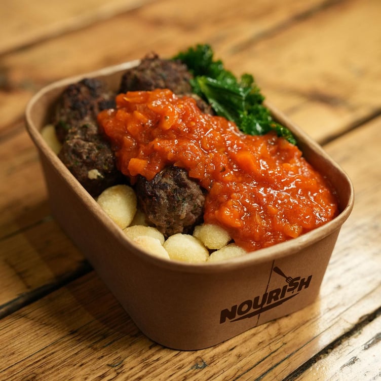 Homemade lean steak meatballs with a roasted tomato and basil sauce with oven roasted gnocchi