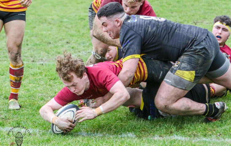 Man of the match Kyle Martin dives in for a try for Douglas RUFC against Burnage at Port-e-Chee on Saturday afternoon (Photo: Richard Ebbutt)