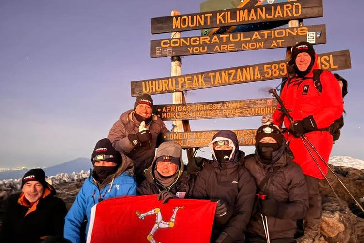 Lucas' friends and family at the Uhuru Peak summit of Mount Kilimanjaro