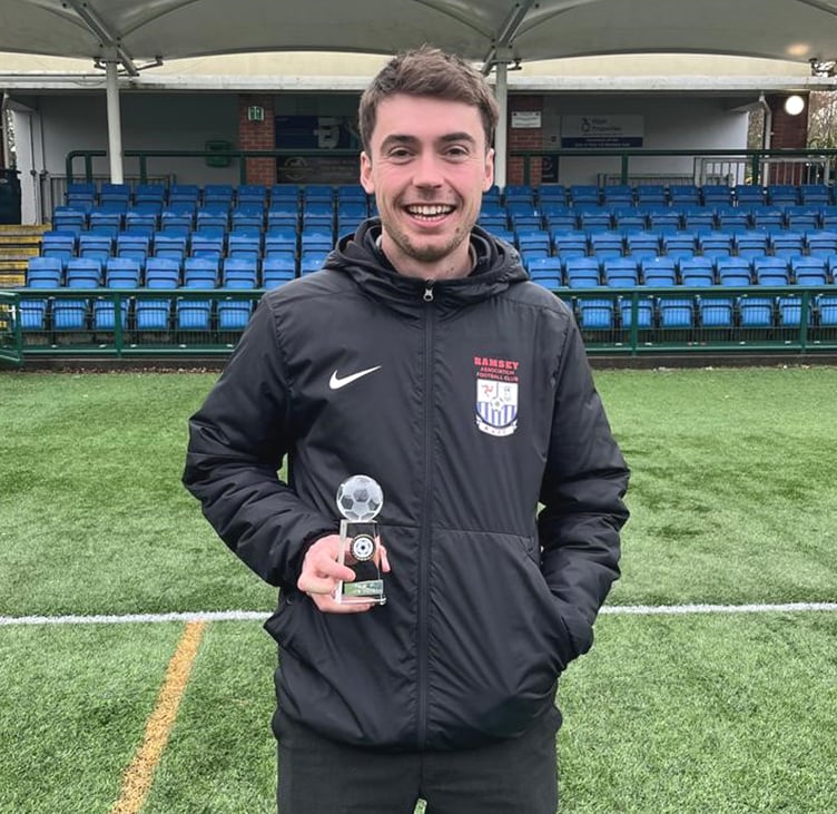 Ramsey's Dylan Pickles with the Canada Life Premier League Player of the Month award for December and January