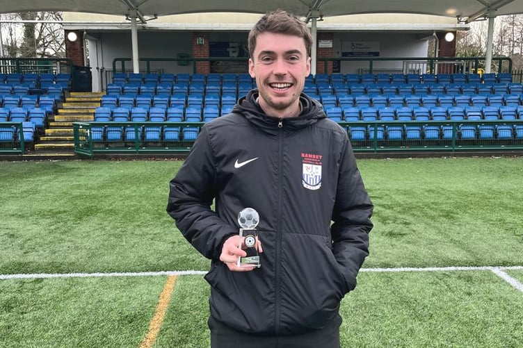 Ramsey's Dylan Pickles with the Canada Life Premier League Player of the Month award for December and January