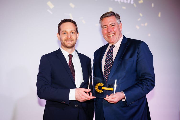 Appleby partner Juan Thornley accepting the Isle of Man Law Firm of the Year award from host Lord Brady of Altrincham