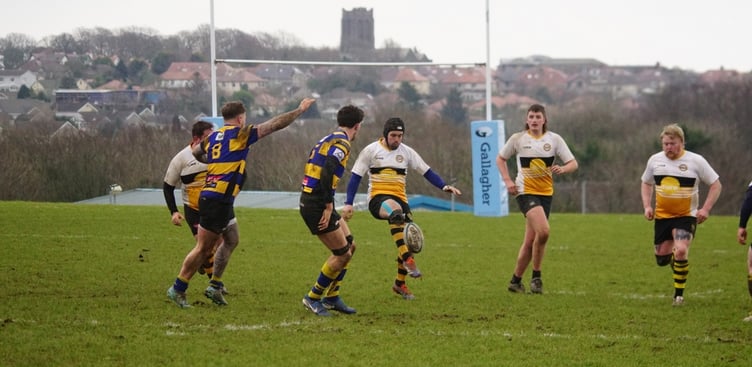 Vagabonds' Dan Bonwick kicks clear against Dukinfield at the weekend (Photo: John Liver/Mumbles Pics)