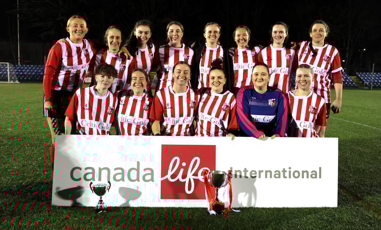Peel players celebrate with the Canada Life Floodlit Cup after defeating Corinthians in the final (Photo: Paul Hatton)