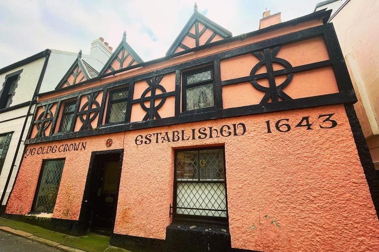 A former pub in Castle Street in Peel gaily painted