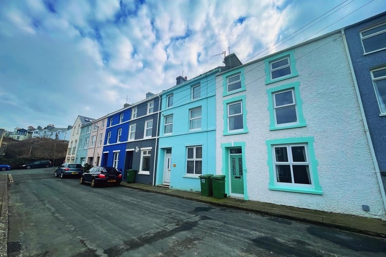 Homes in Stanley Mount in Peel painted in bright colours