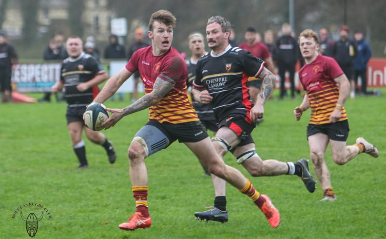 James Ross in action for Douglas against Crewe and Nantwich earlier this season (Photo: Richard Ebbutt)