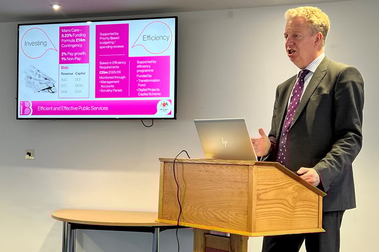 Treasury Minister Dr Alex Allinson at a pre-Budget briefing