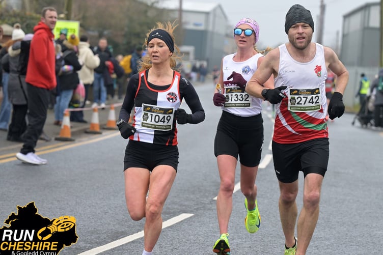Western AC runner Dawn Atherton (centre) on her way to finishing Sunday's Wrexham half-marathon in a new personal best time of one hour 25 minutes and 22 seconds, a second Island Games A standard for this summer's Games in Orkney (Photo: Run Cheshire)