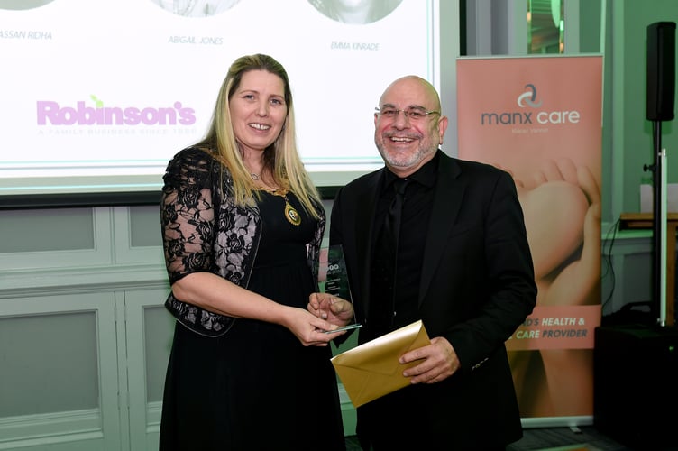 Hassan Ridha, winner of the island's Choice Award, presented by Mayor of Douglas Natalie Byron-Teare