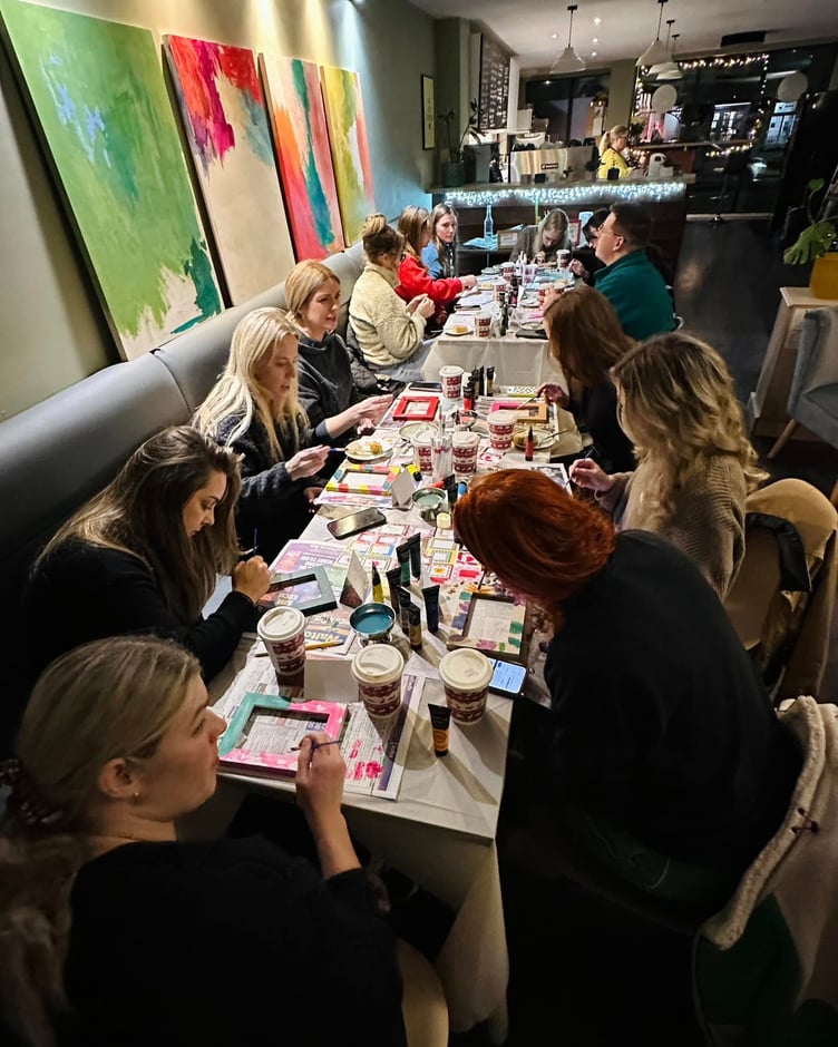 A great turnout for the frame painting workshop at Arty Barista