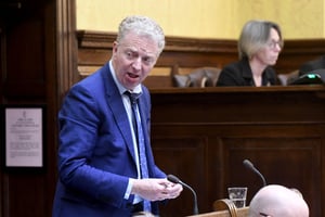 Treasury Minister Dr Alex Allinson