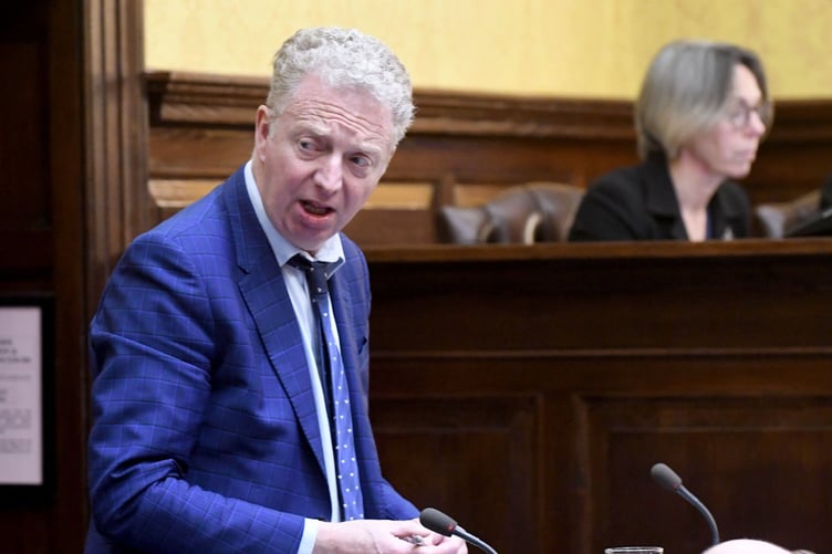 Treasury Minister Dr Alex Allinson