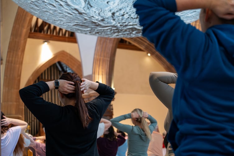 Pilates under the moon at Peel Cathedral