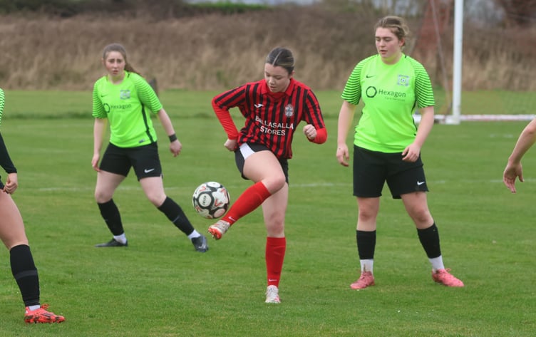 Malew's Caitlin Williams closely watched by Corinthians' Dani Foster (left) and Emily Rawlins during Sunday's Canada Life Women's League game (Photo: Paul Hatton)
