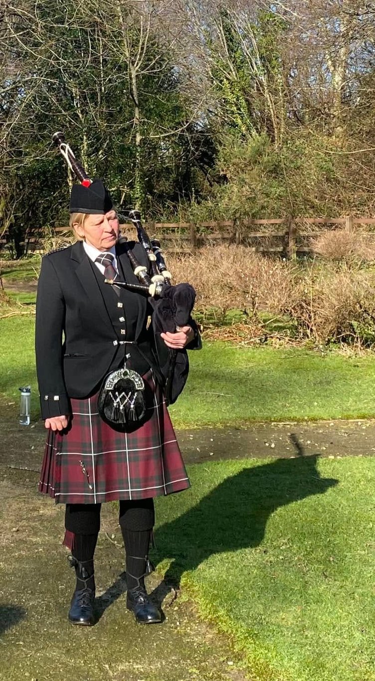 Jane Falconer on the bagpipes