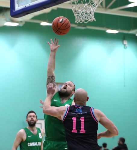 Martin French goes to the basket for Cavaliers as Pirates' Mikey Brereton attempts to defend during last Thursday's senior league match at the NSC (Photo: Oliver Hamilton)