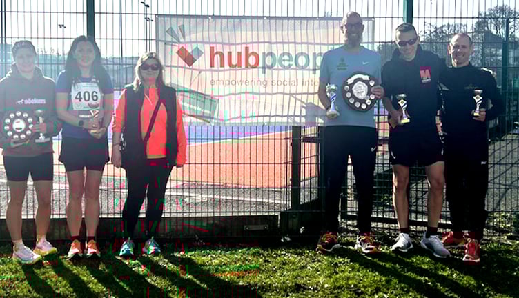 The prizewinners in the HubPeople 20-Mile Road Race at the NSC on Sunday.