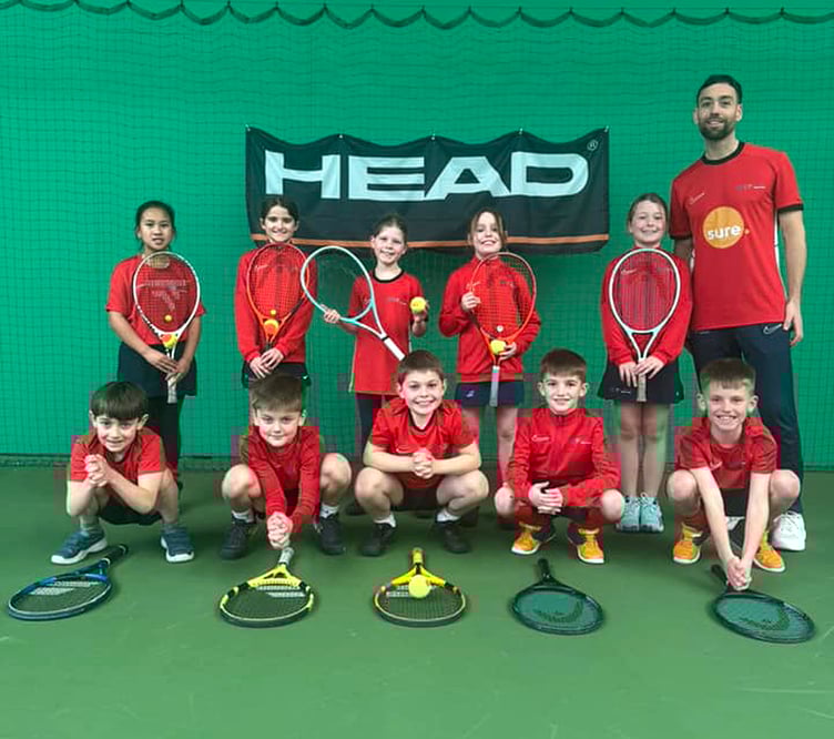 The Isle of Man nine-and-under team that competed in the LTA Tennis for Britain County Cup in Wrexham last weekend, pictured with coach Max Stokoe