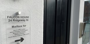 Police raid offices in international money laundering probe