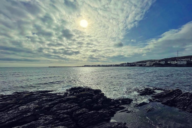 The view of Port St Mary during a walk from Gansey to Perwick Bay