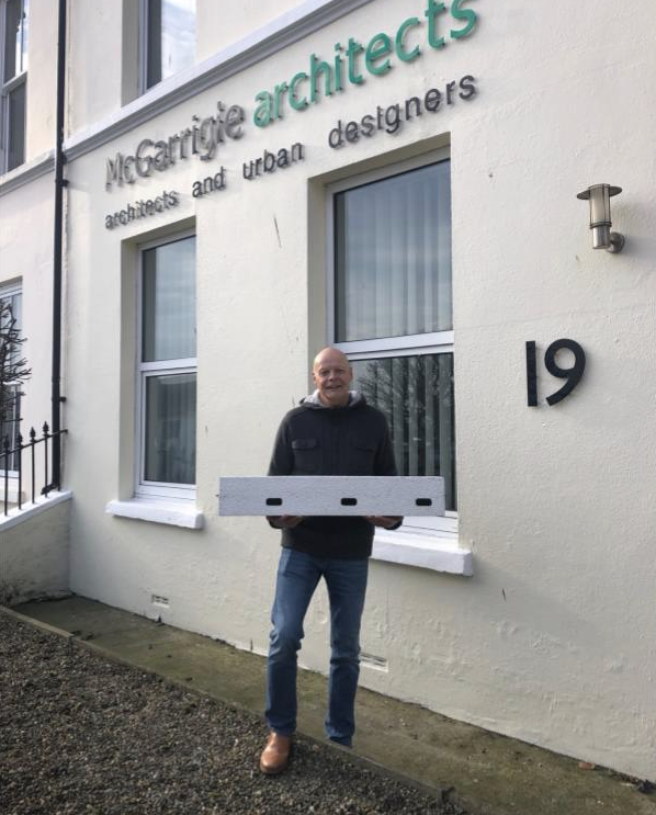 Niall McGarrigle holding a Genesis swift box