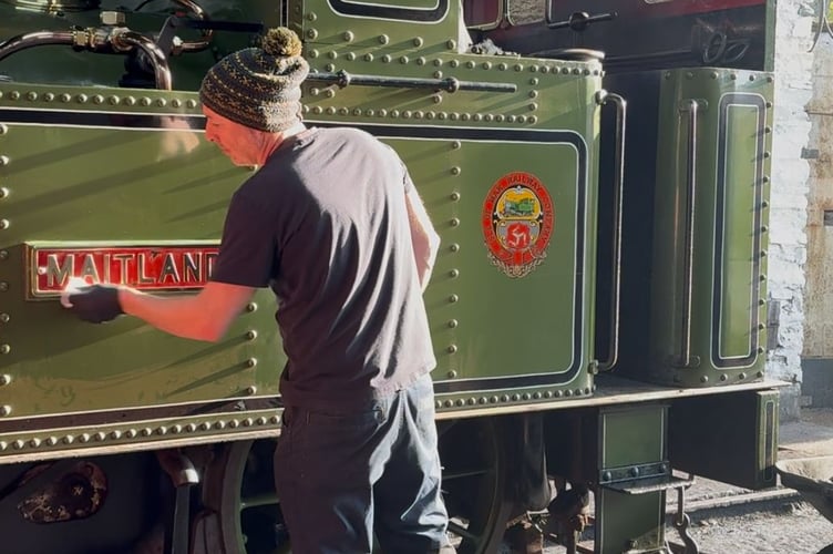 Final preparations to locomotive number 13 before its first day of the season