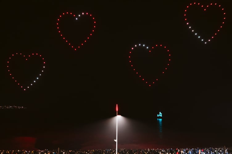 The drones create a series of love hearts during the display in Douglas Bay