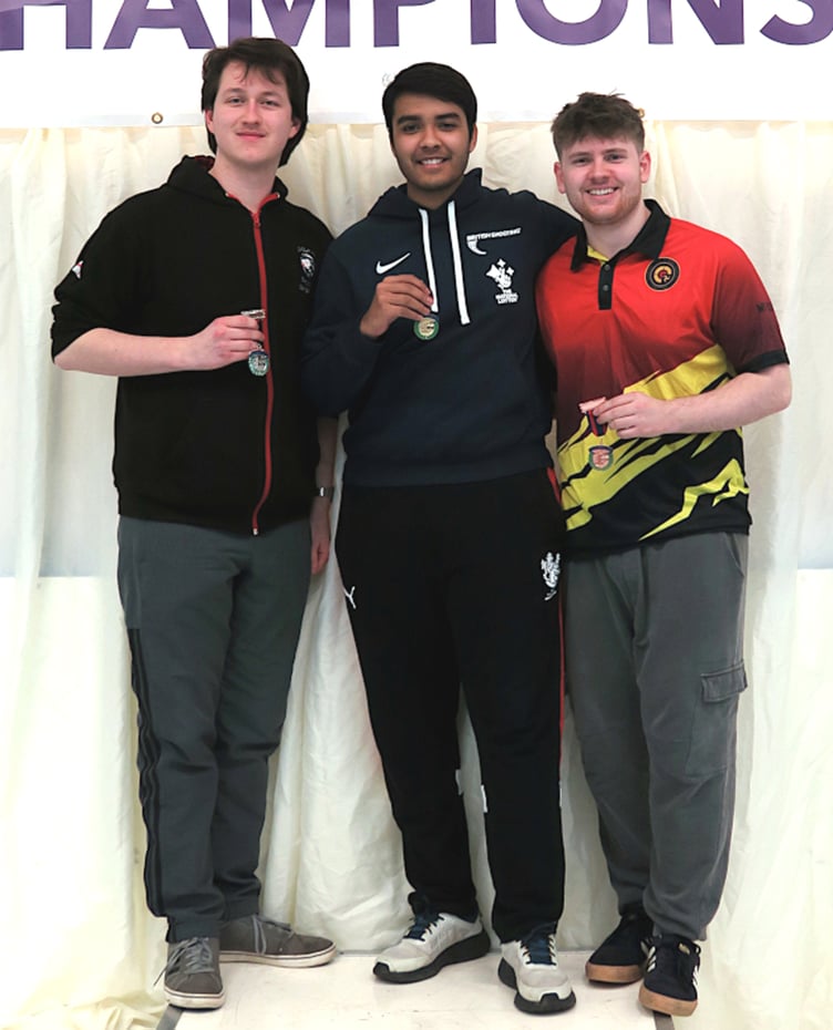 Isle of Man shooter Joshua Holden (right) with his bronze medal on the junior men's air pistol podium at the recent British Open Airgun Championships