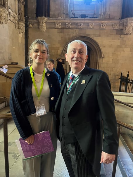 Daisy Arnold and Speaker of the House of Commons, Sir Lindsay Hoyle MP, on the steps of Westminster Hall