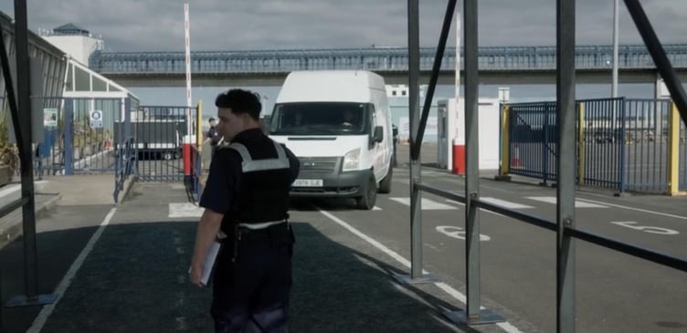 The van being stopped for a search at Douglas Sea Terminal, featuring extras from the Isle of Man (Photo - BBC iPlayer)