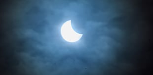 Skywatchers capture partial eclipse
