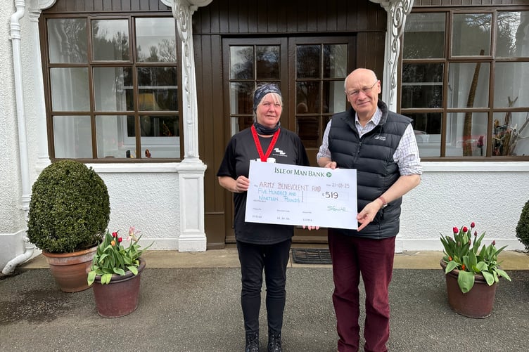 Lieutenant Governor, His Excellency Sir John Lorimer presents a cheque to Sandra Smith