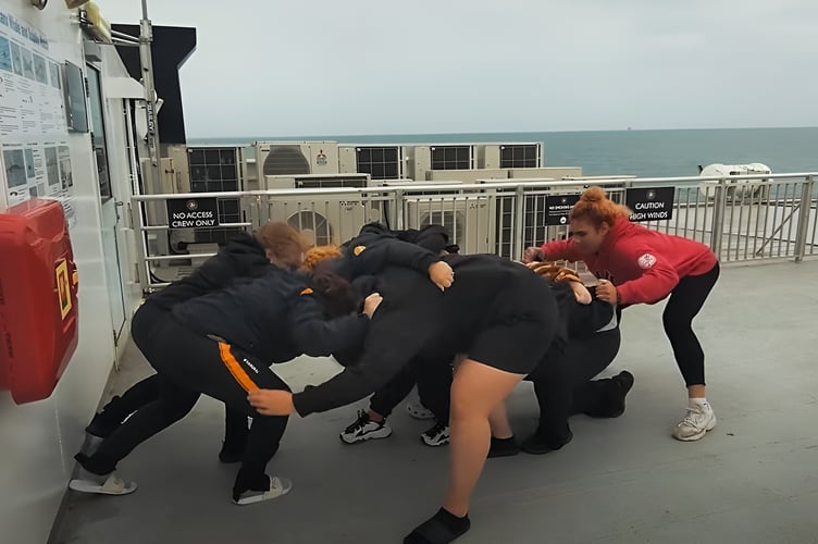 Vagabonds Ladies Rugby Team in a scrum on board the Manxman ferry