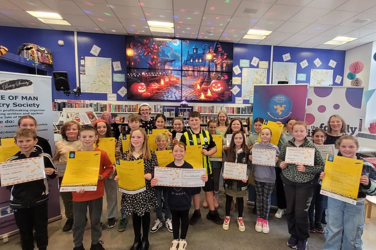 Youngsters at the launch of the Children's Poetry Trail at the Family Library in Douglas in 2024