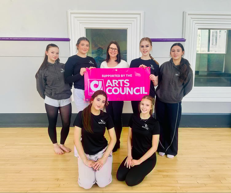 Dancers from the Mannin Youth Dance Company with Chair of the Isle of Man Arts Council Sarah Maltby MHK (centre)