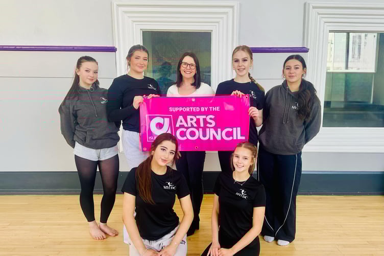 Dancers from the Mannin Youth Dance Company with Chair of the Isle of Man Arts Council Sarah Maltby MHK (centre)