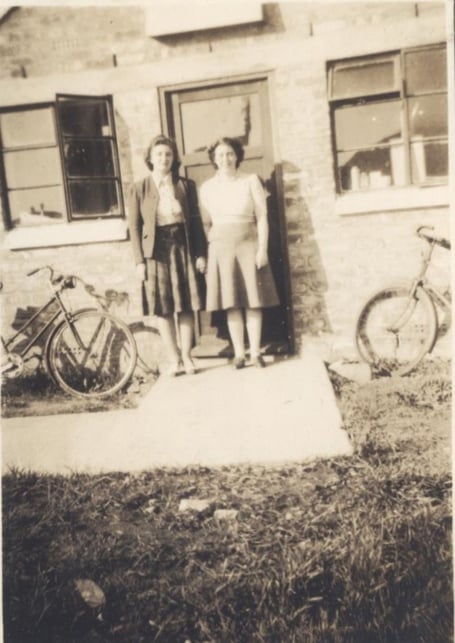 Kathleen Oates' photograph of Cabin K, Ronaldsway with Wren friends in civvies