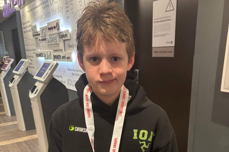 Henry Mackenzie with his silver medal after producing a fantastic performance in the 50-breaststroke age 11 final