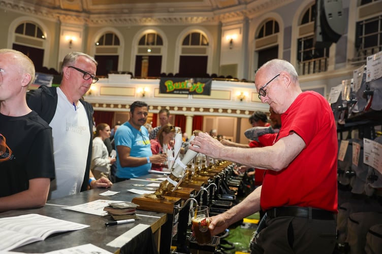 Volunteers pouring the pints