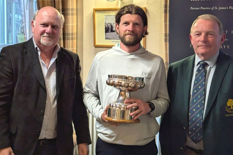 Isle of Man golf Daryl Callister receives the Sandiway Oak trophy after triumphing in last weekend's competition in Cheshire