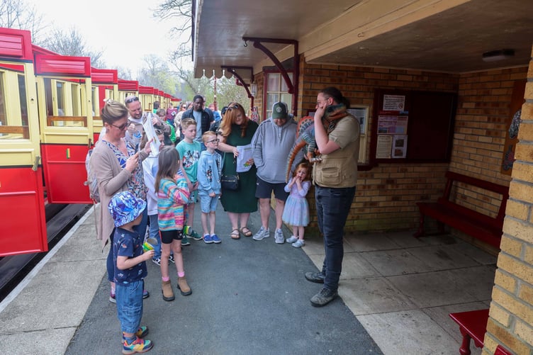 Young families get off the train in Ballasalla