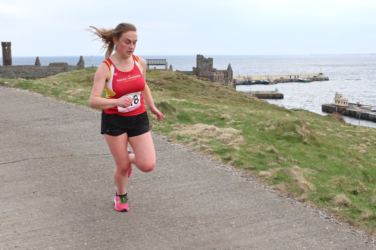 19/04/2025: Leading local in the Women's Peel Hill Race, Laura Dickinson, Isle of Man Easter Festival of Running. PICTURE BY DAVE KNEEN PHOTOGRAPHY.
