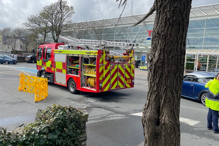 Fire service staff attend the incident at the Tesco supermarket in Victoria Road, Douglas this afternoon