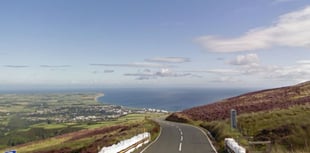 Driver injured after car overturns on Mountain Road